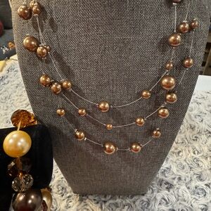 Brown Multi-Strand Beaded Necklace with Elegant Design